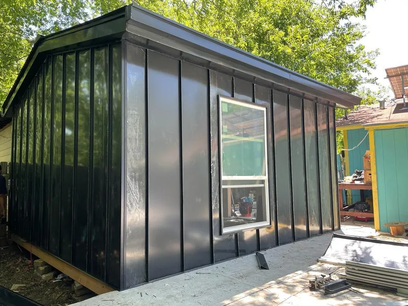 Black standing seam metal wall panels for Metal Roof Installation in Jericho