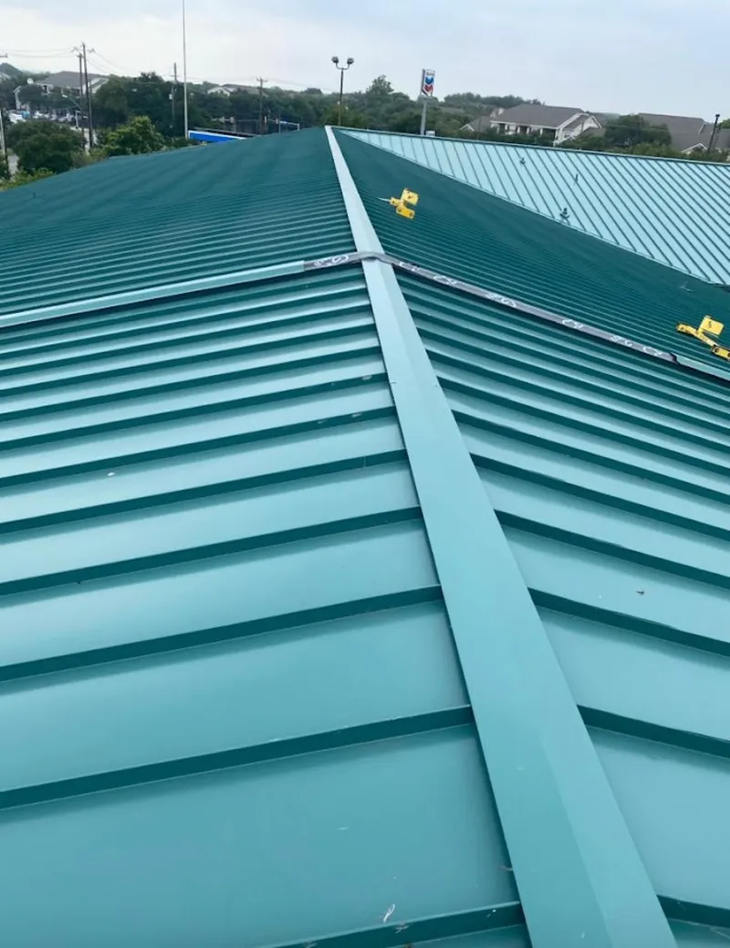 Green commercial metal roof ridge and valley for Metal Roof Repair in Jericho
